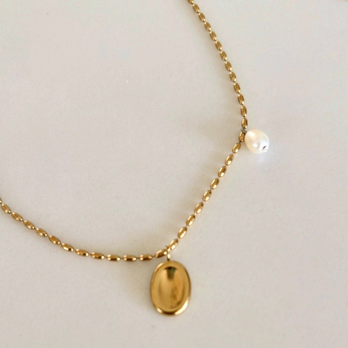 Delicate Pearl Charm Necklace